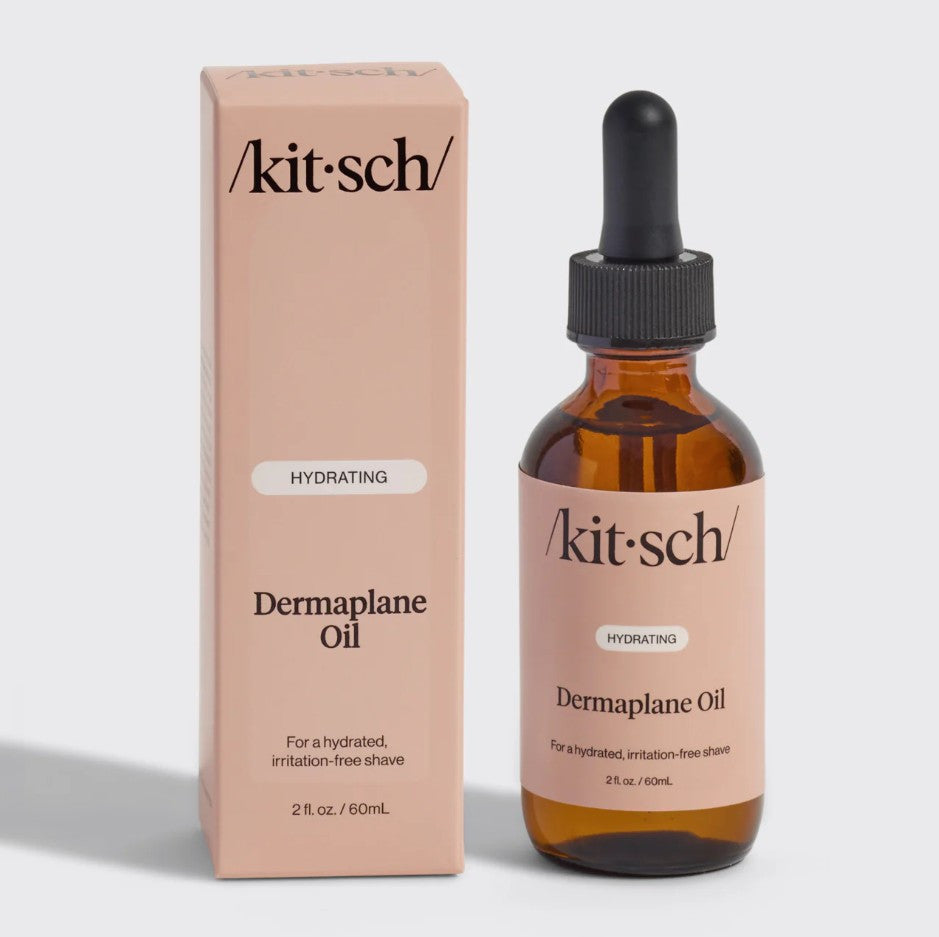 Bottle of Hydrating Dermaplane Oil with a clear liquid inside.