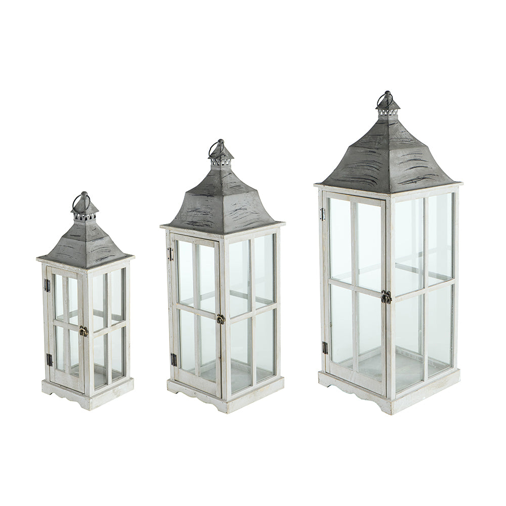 Window Scape Lantern lantern made of fir wood, metal frame, and glass panels.
