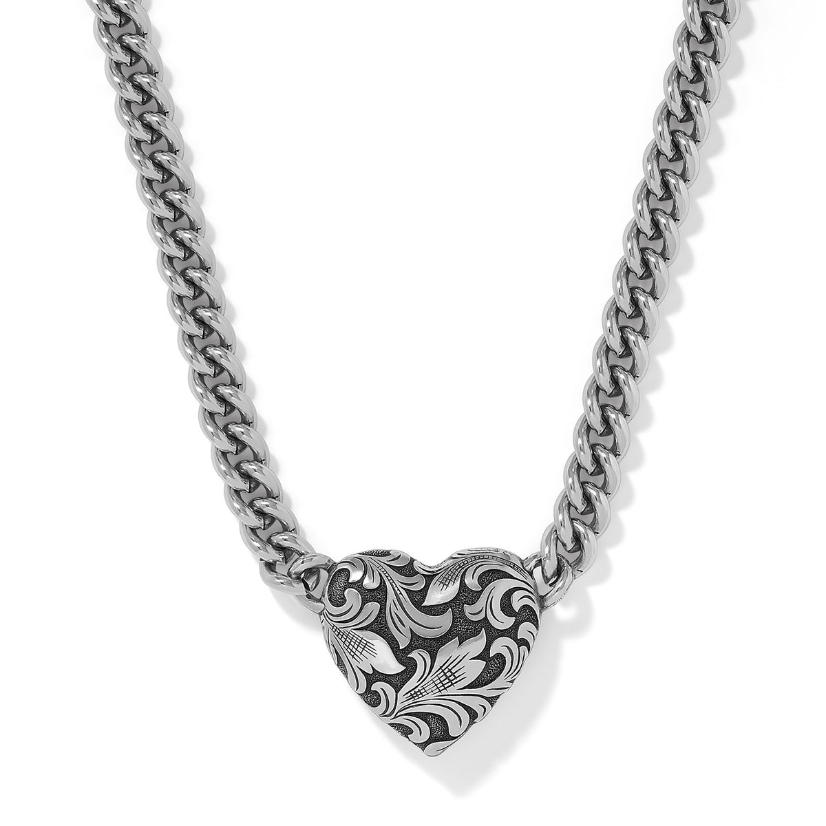 Silver Ferrara Florentine heart necklace featuring an engraved scrollwork heart on a curb chain.
