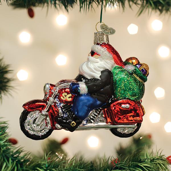 Biker Santa glass ornament featuring Santa Claus in a leather jacket riding a red motorcycle.