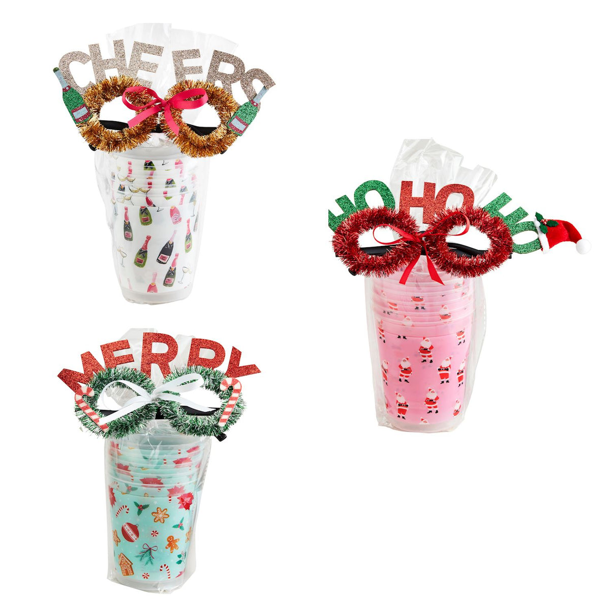 Three holiday party cup sets, each with festive glasses and themed cups: "Cheers" with champagne, "Ho Ho Ho" with Santa, and "Merry" with gingerbread.