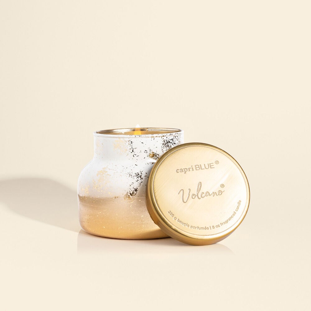 Volcano Glimmer Petite Jar candle in a small glass jar with a black wick and shimmering glitter wax.
