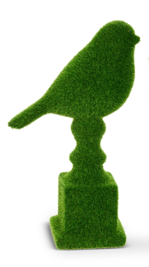 Green moss-covered bird figurine perched on a decorative pedestal.