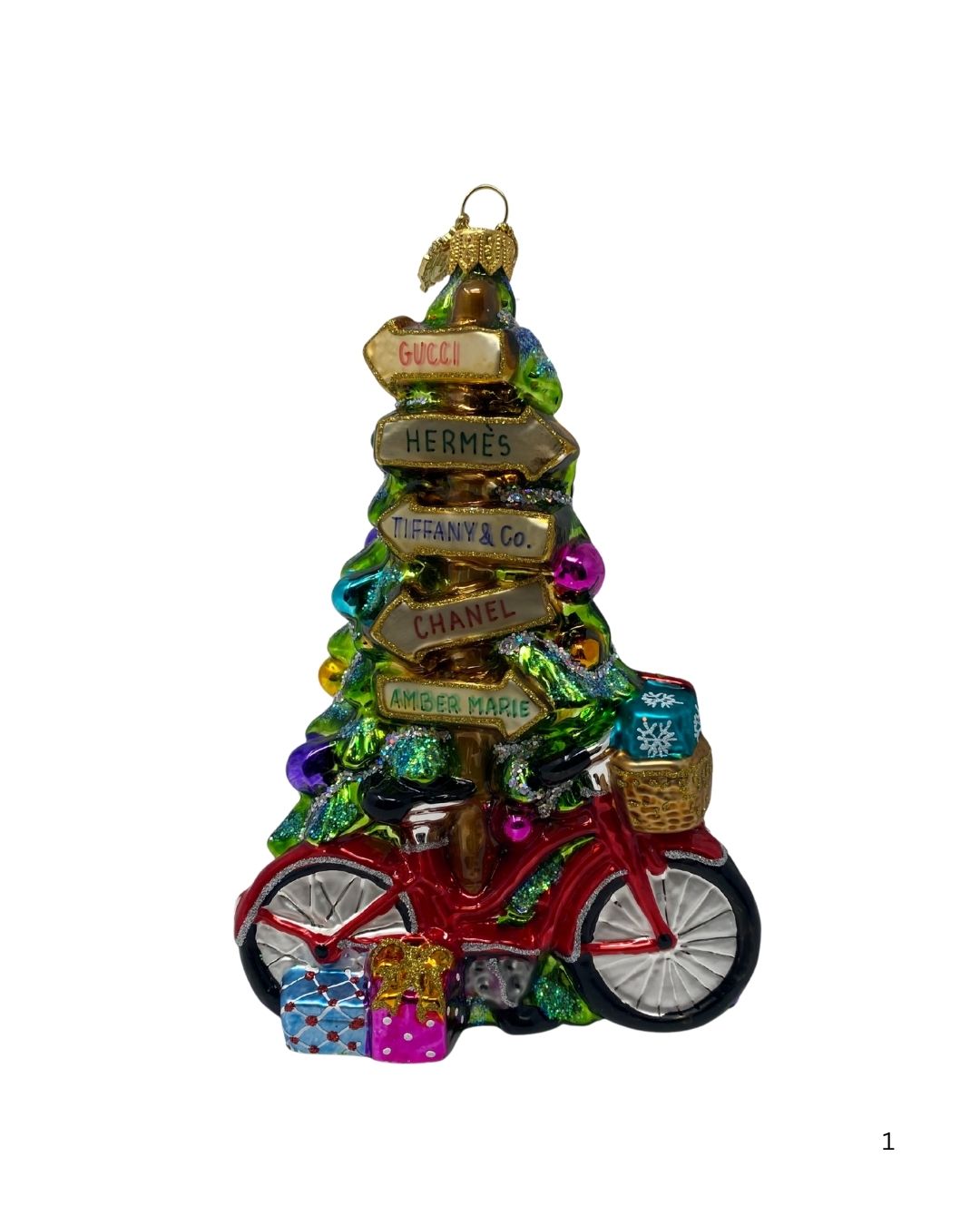 Holiday Trailblazer Bicycle glass ornament with a glittery tree and designer brand signposts.