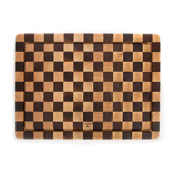 Handmade rectangular acacia wood carving board with rubberwood accents.