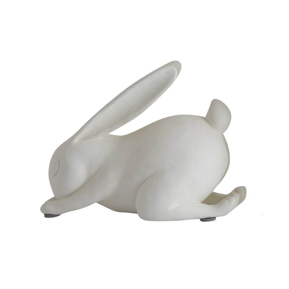 White forward bend yoga rabbit with smooth curves
