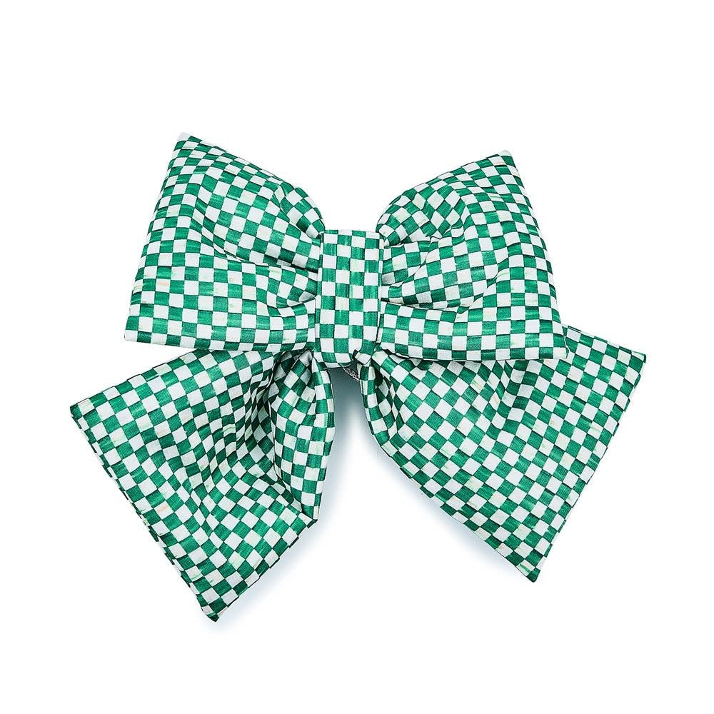 Small green polyester bow with a checkered pattern.