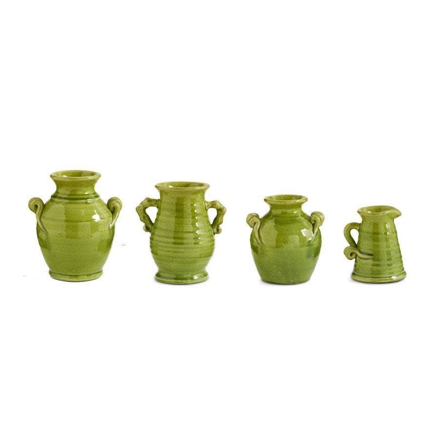 Green ceramic vase with a sleek cylindrical silhouette.