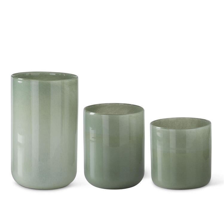 Green glass cylinder vase with a sleek, smooth surface designed to hold fresh flowers.