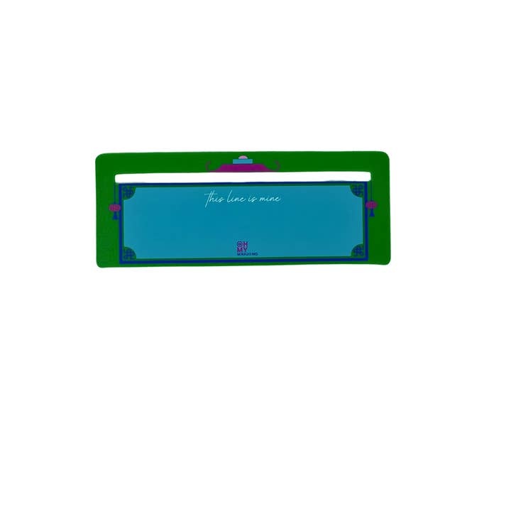 Green plastic Mahjong line finder tool with a curved handle.