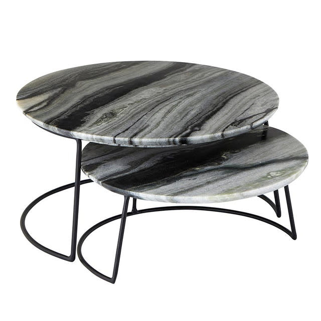 Nested grey marble trays with dark green veining on an iron base