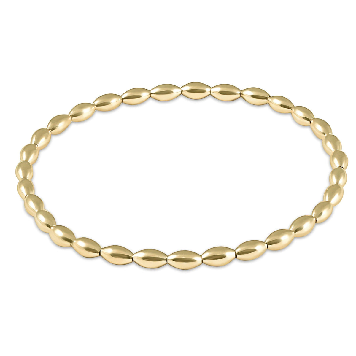 Harmony small gold bead bracelet on high-performance elastic with a slight stretch.