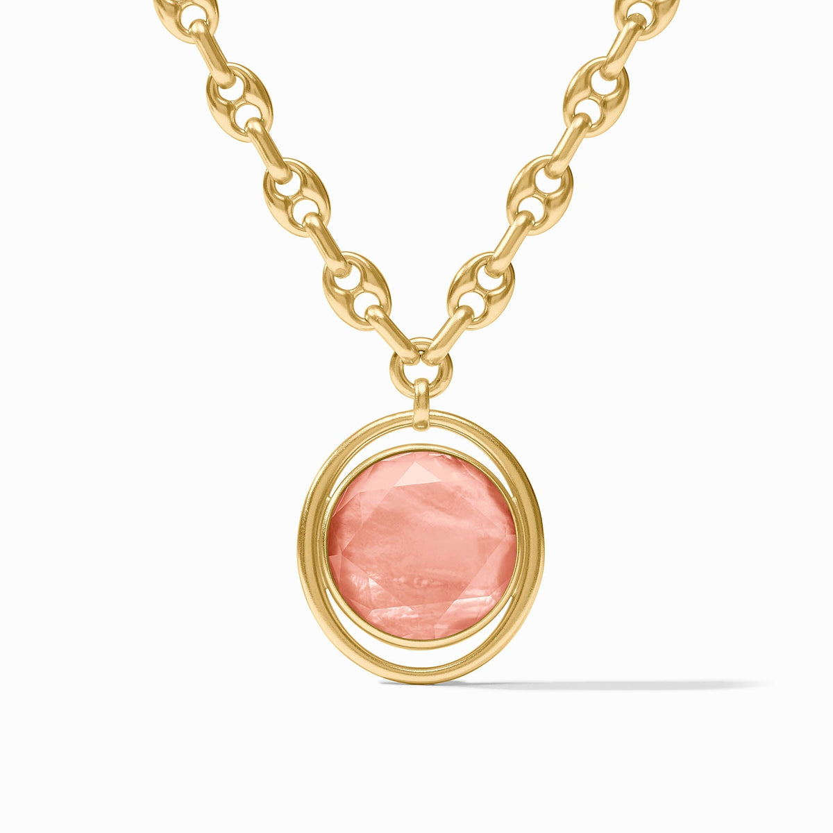 Adjustable statement necklace with a large gold pendant featuring imported glass stones on a toggle clasp.