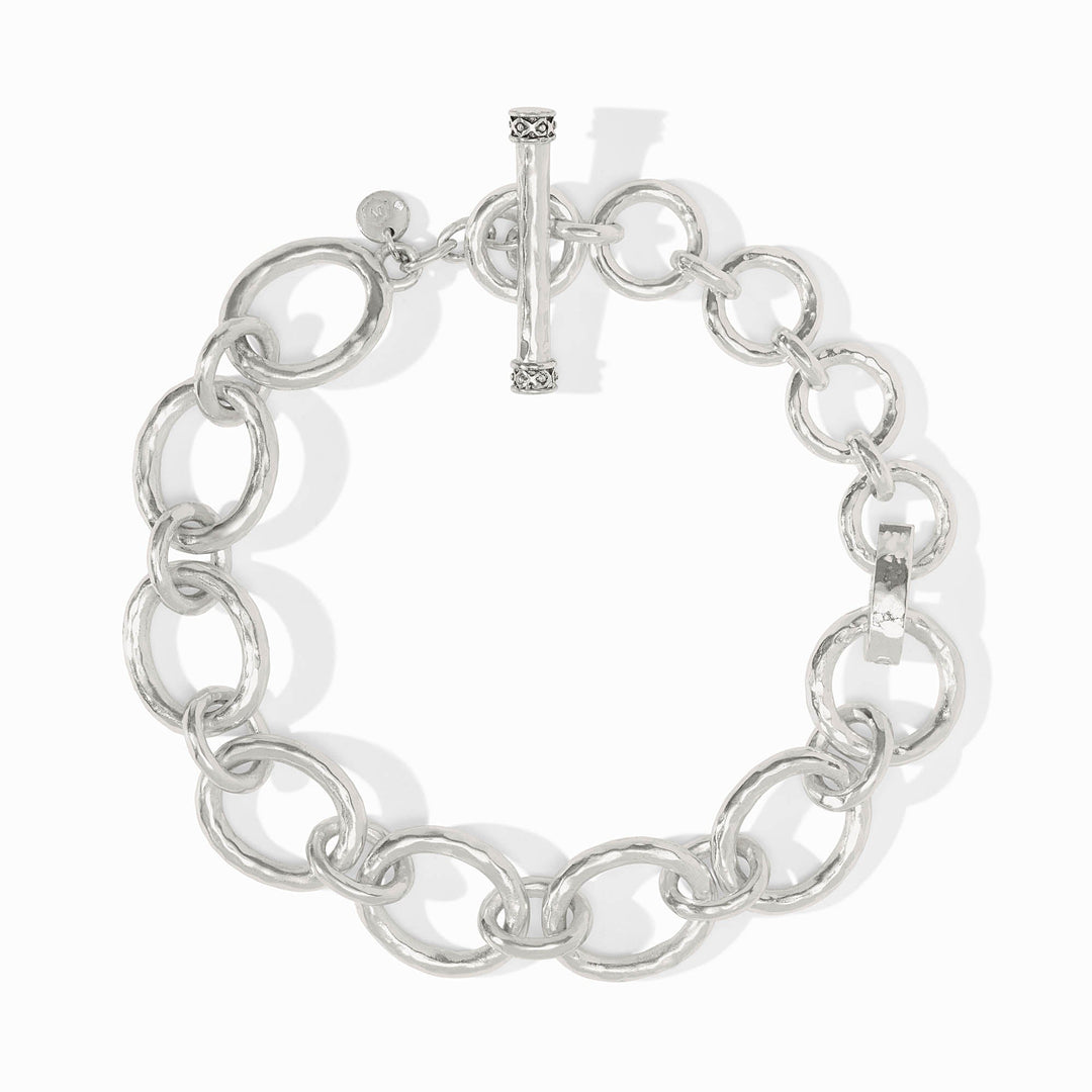 Silver-plated hammered link extender with a toggle clasp and circular links.
