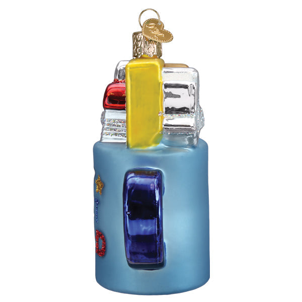 Side view of a light blue Best Dad Mug glass Christmas ornament with a dark blue handle.