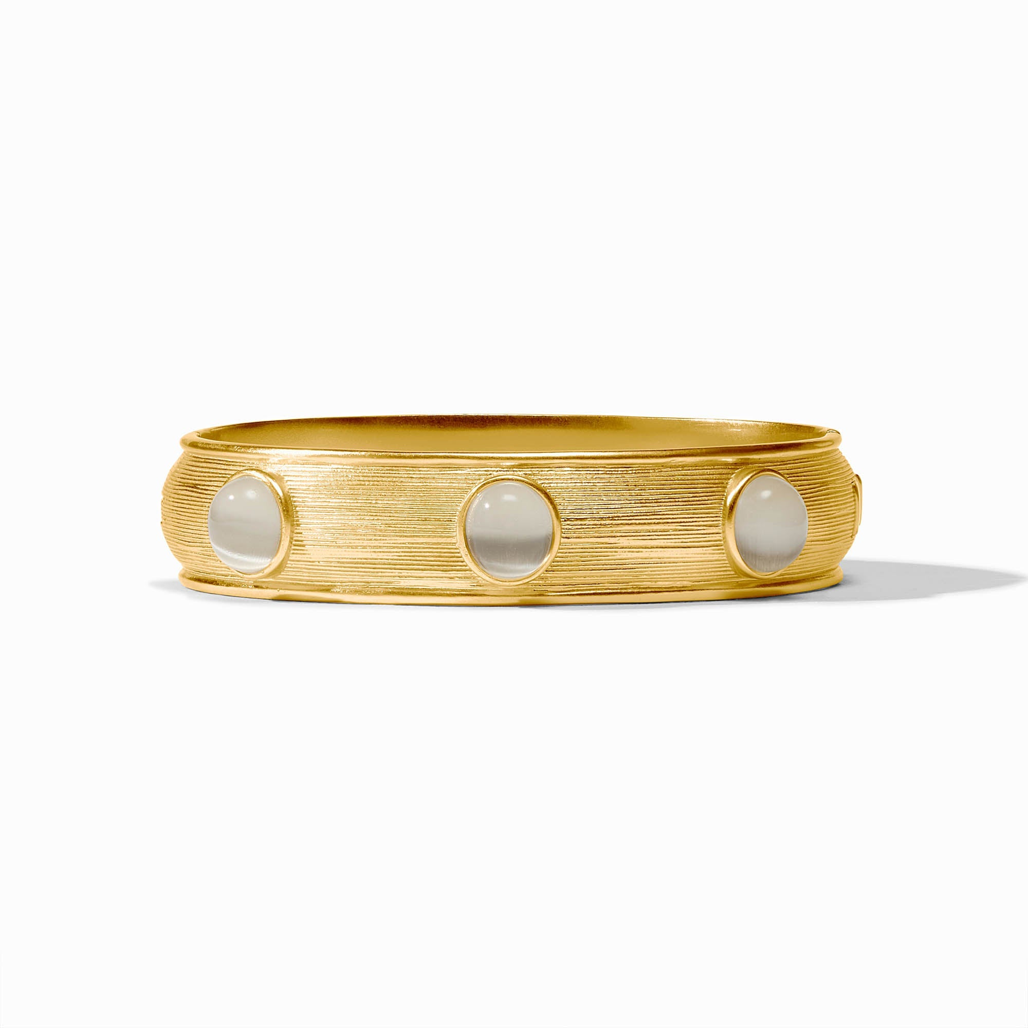 Gold-plated Cobblestone Stone Hinge Bangle with three round, white glass stones.