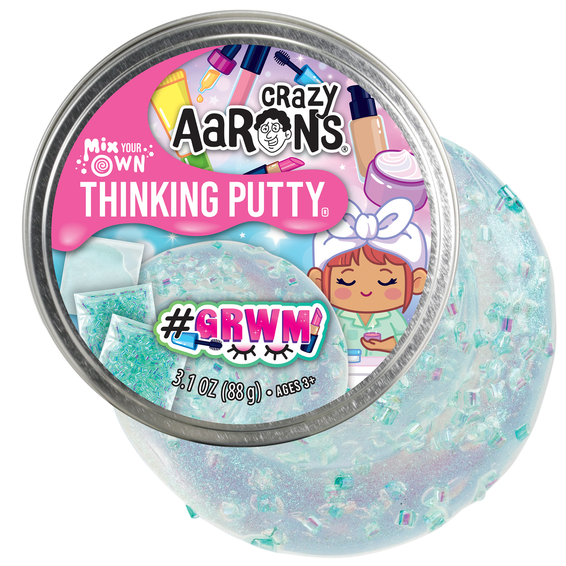 Tin containing clear silicone thinking putty with a colorizer and mix-in accessories.