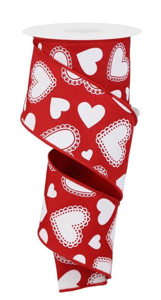 Red polyester scallop hearts fabric with a heart-shaped edge pattern