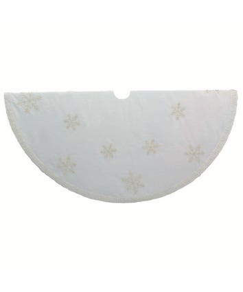 Round ivory tree skirt with snowflake glitter pattern made of polyester and cotton.