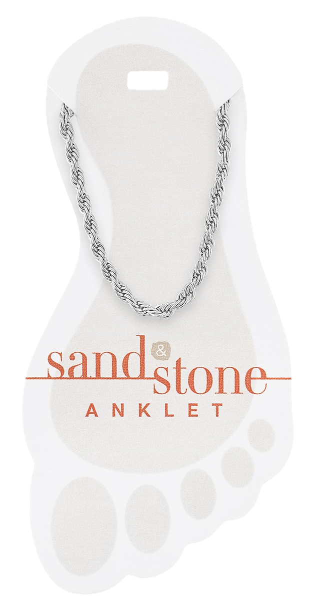 Silver rope chain anklet with sandstone beads on a stone background