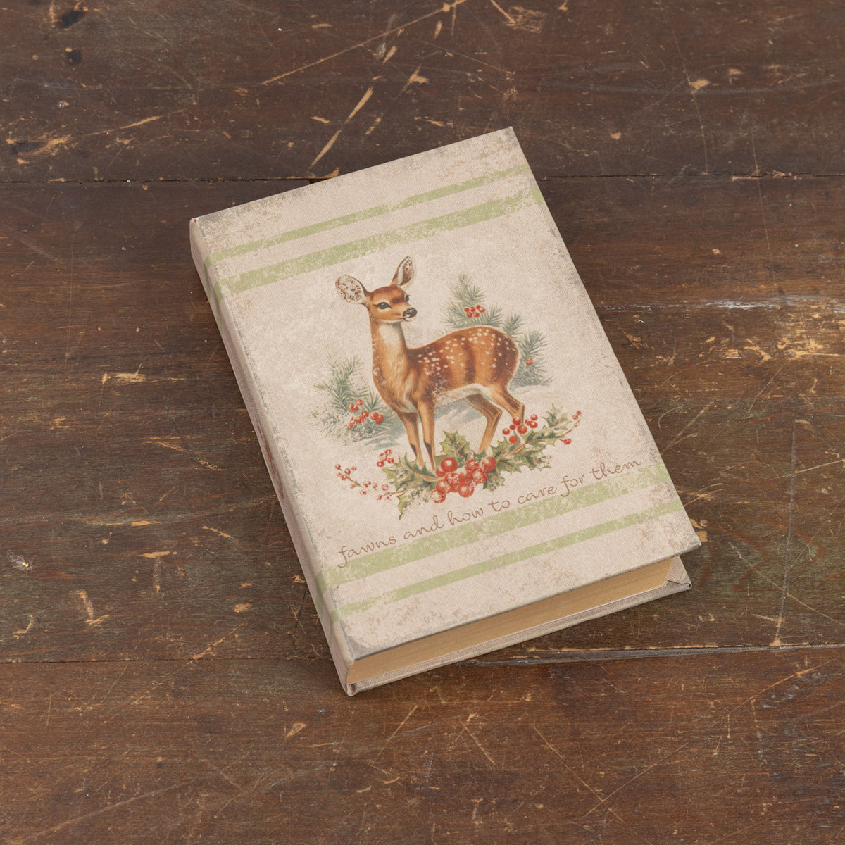Hardcover journal titled 'Fawns and How to Care for Them' with a wood cover featuring fawn illustrations.