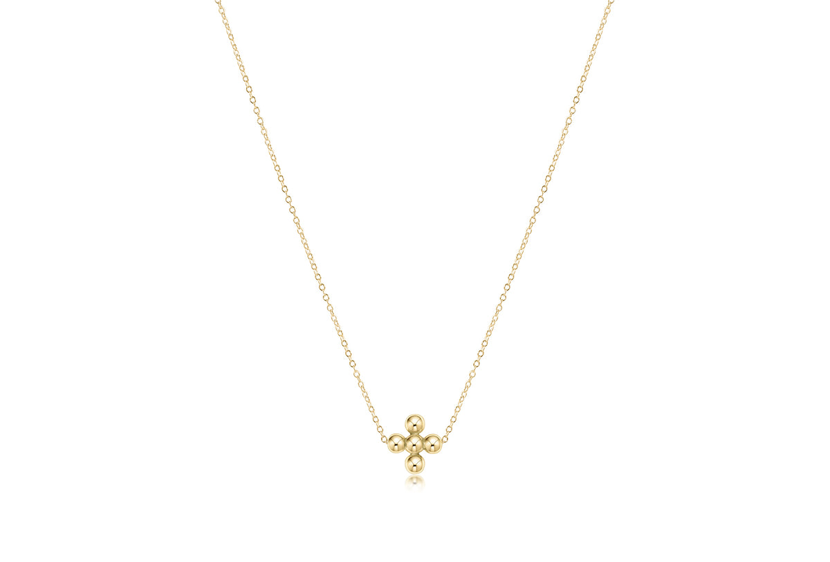 16-inch gold-filled chain necklace featuring a signature cross pendant made of 4mm gold beads.