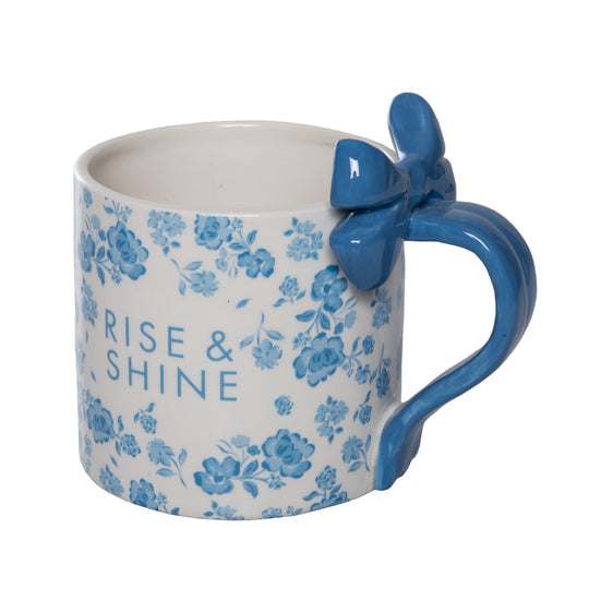 Ceramic Rise & Shine mug with bow handle in light blue