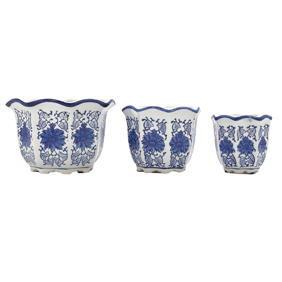 Blue and white floral ceramic pot with ruffled lip style