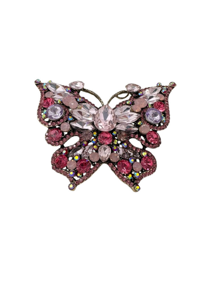 Crystal butterfly brooch with pink, purple, and clear faceted stones on a gold-tone metal base.
