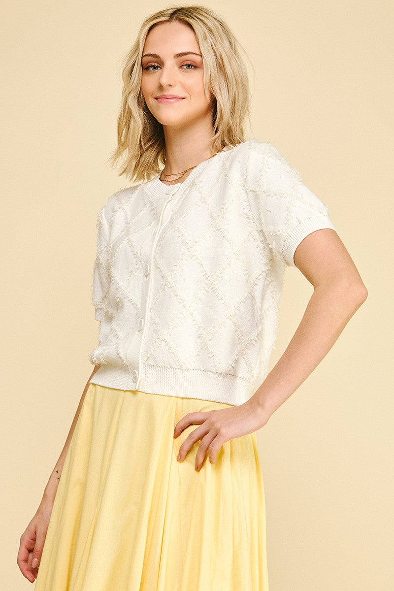 Amelia textured diamond pattern knit cardigan in natural cotton with a relaxed silhouette.