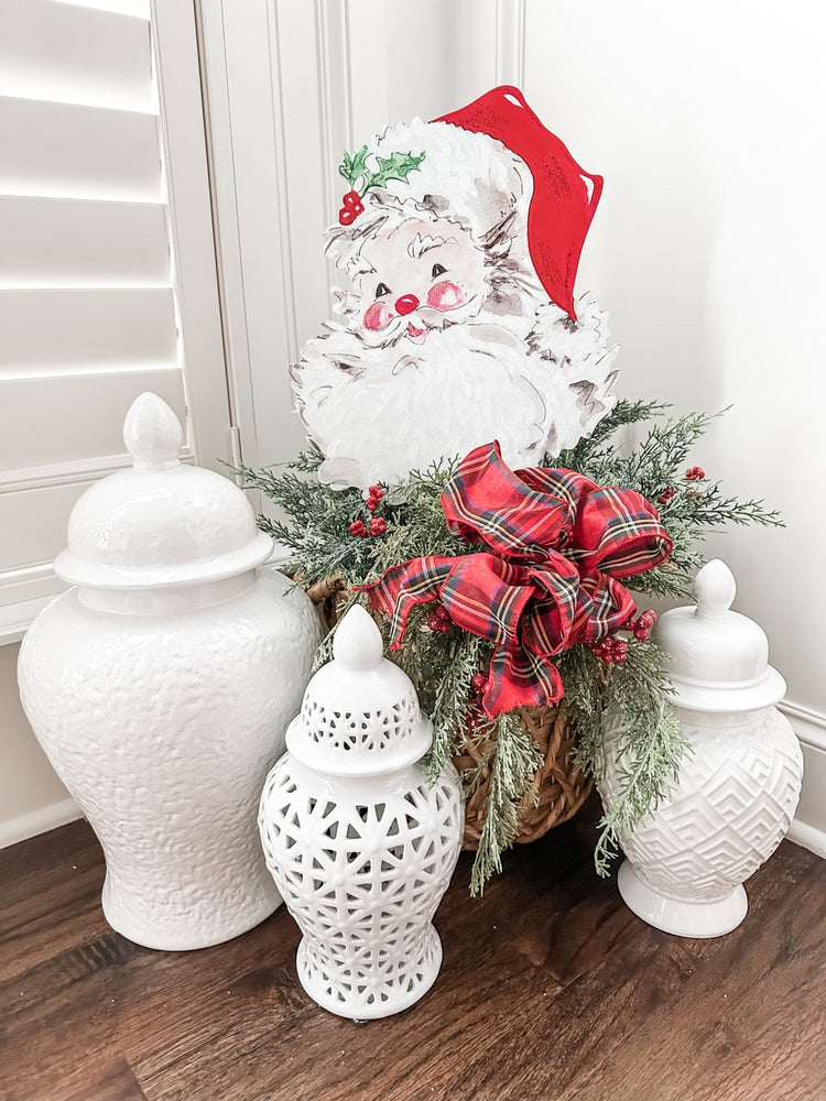 Red plastic Santa stake with white beard detail