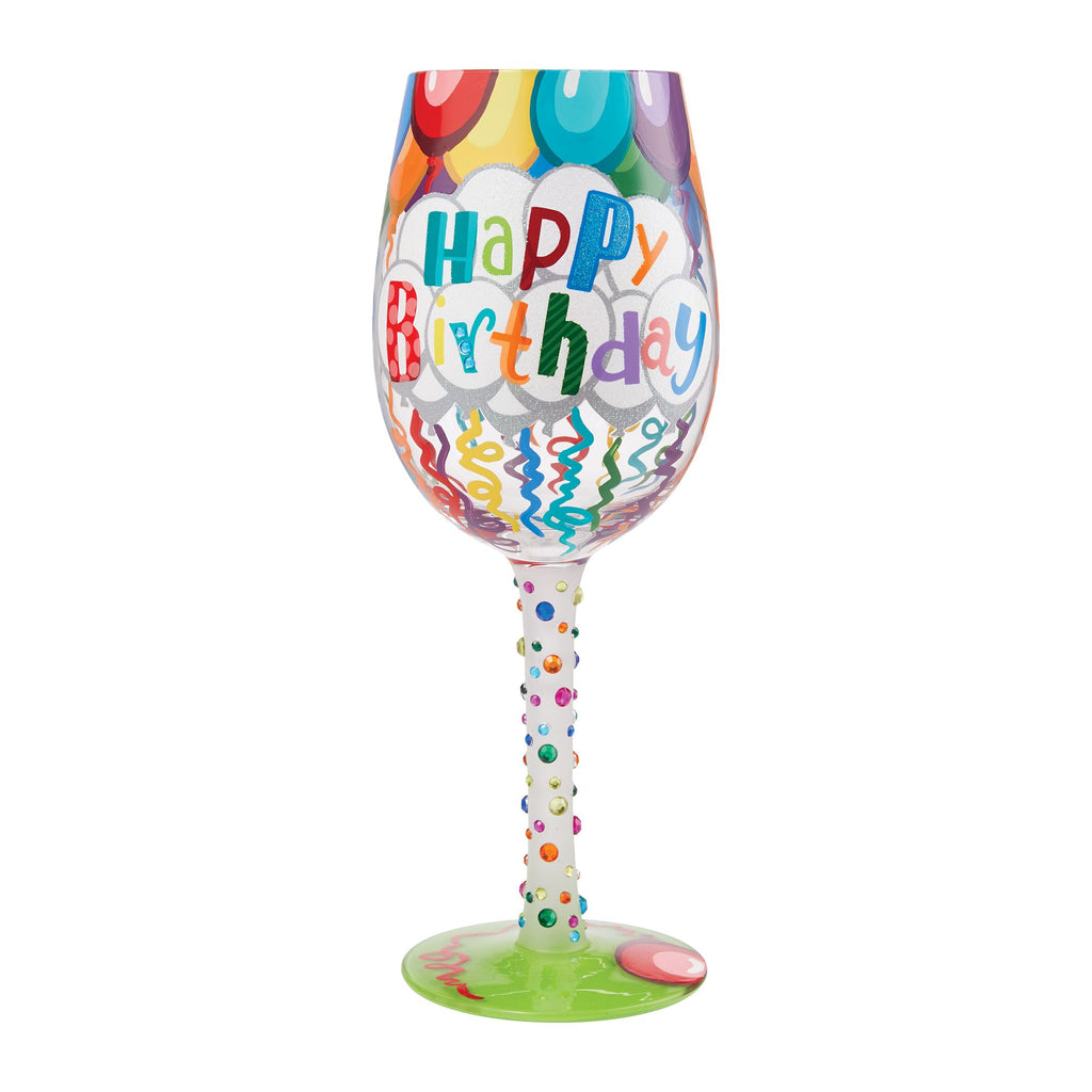 Colorful blown glass wine glass with hand-painted designs, glitter accents, and a cocktail recipe printed on the base.