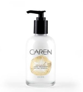 Seaside 8oz Hand Treatment by Caren in a clear bottle with a black pump dispenser.