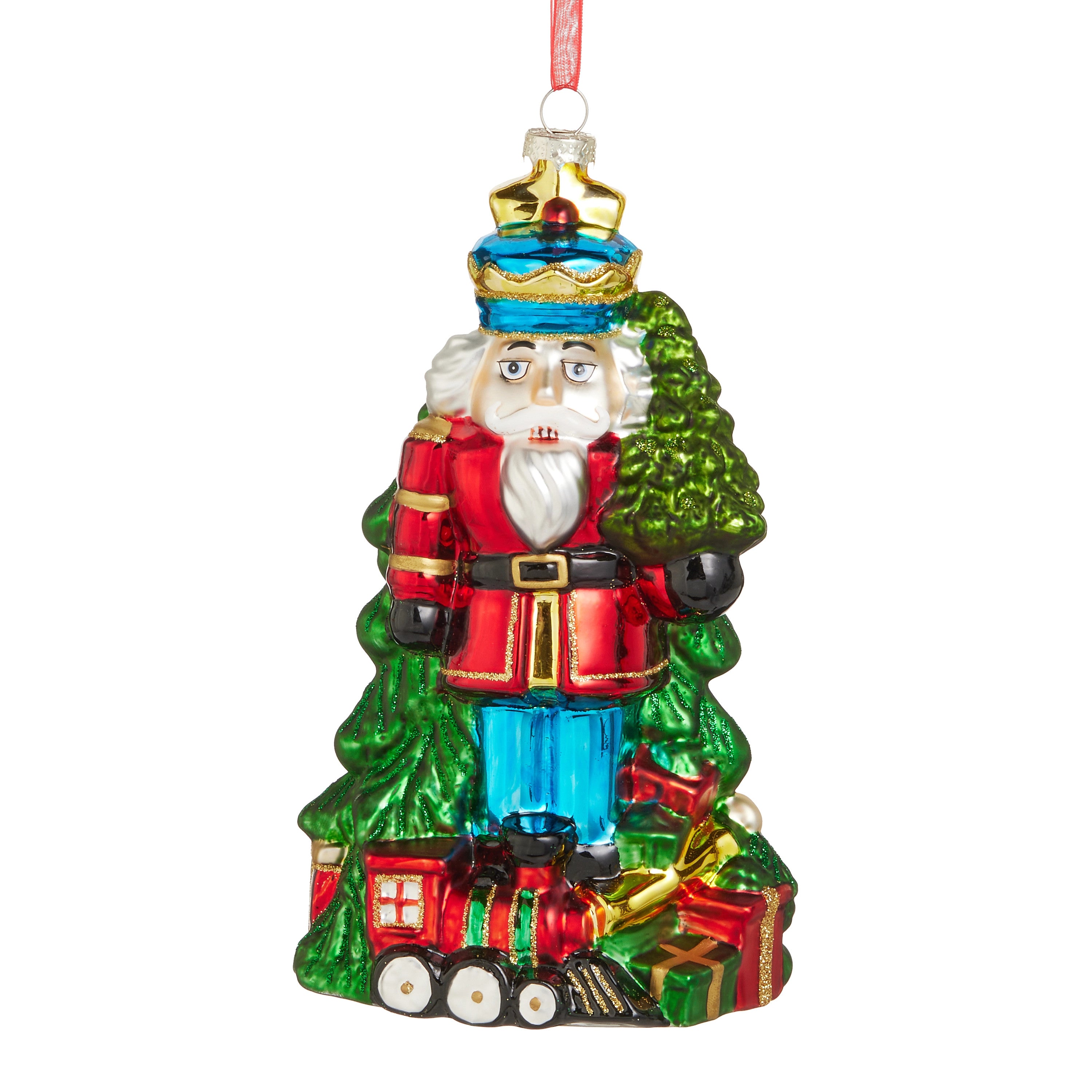 8-inch glass nutcracker ornament wearing a red coat and blue pants, standing with gifts and a train.