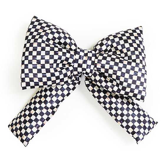 Small black and white checkered bow with two loops and two tails.