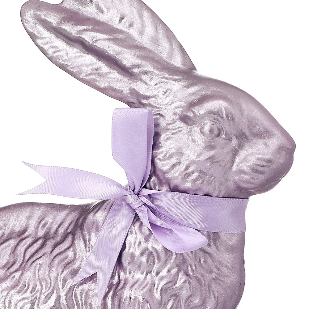 Ten-inch resin Easter bunny with shimmering gold foil finish and satin ribbon accent.