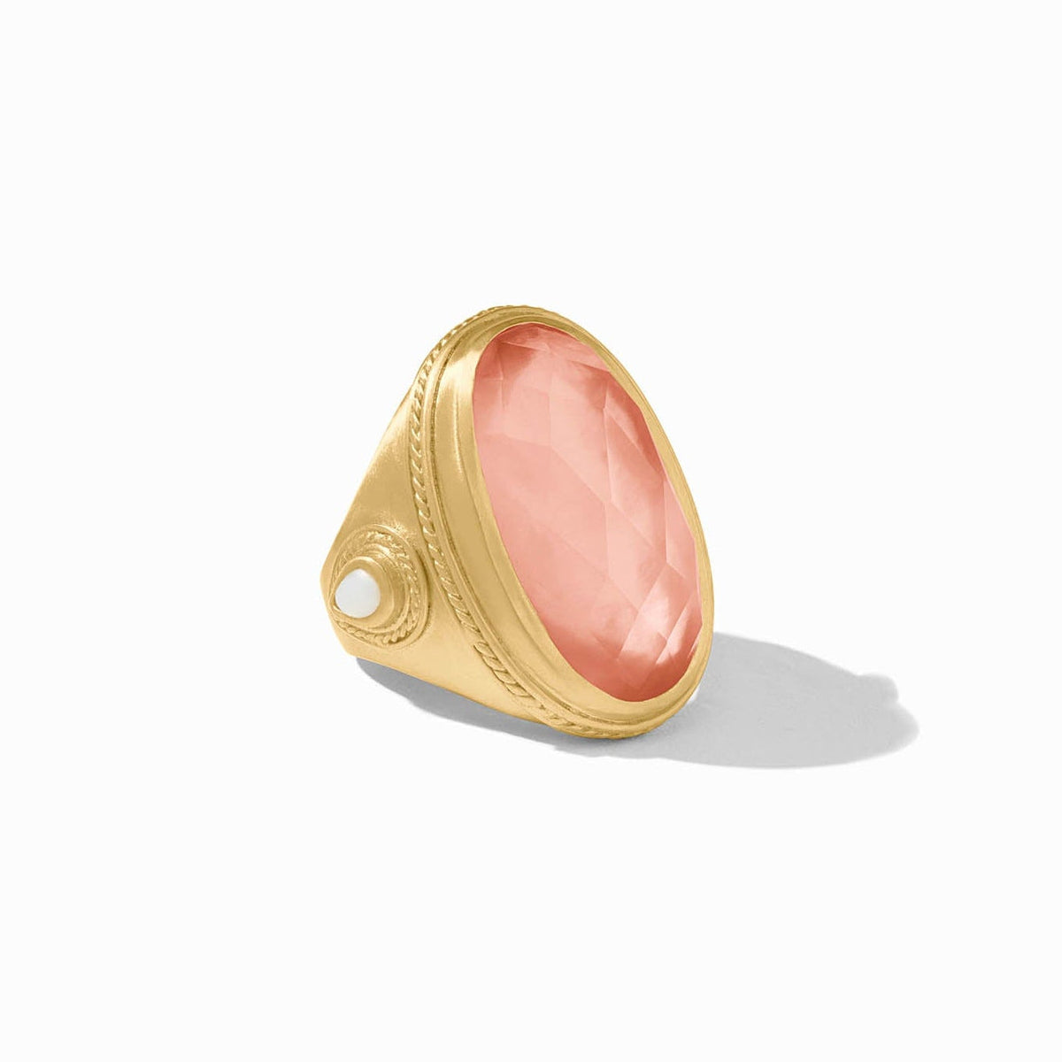 Gold-plated Cannes statement ring featuring a pear-shaped gemstone with mother-of-pearl accents and twisted wire details.