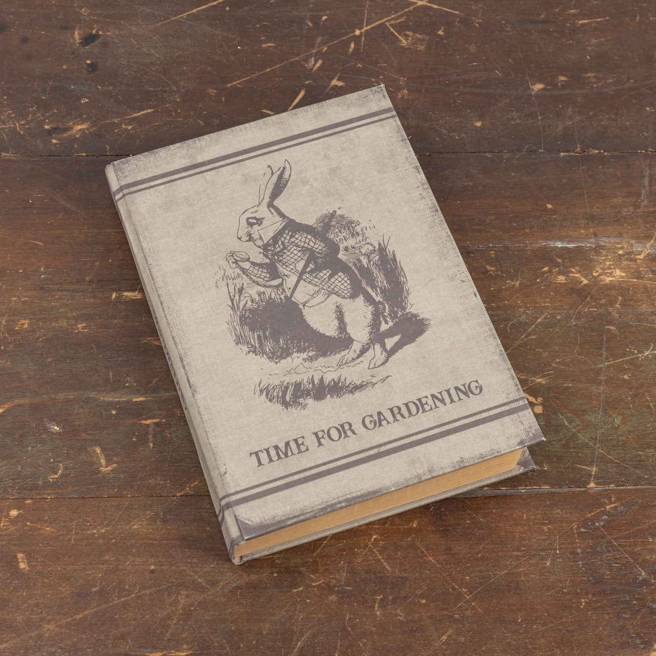 Hardcover gardening journal with wood cover featuring a botanical illustration on the front.