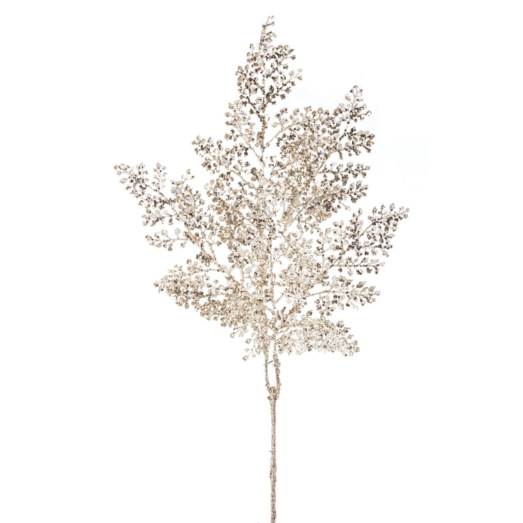 Champagne-colored plastic glitter spray with shimmering, textured branches on a long stem.