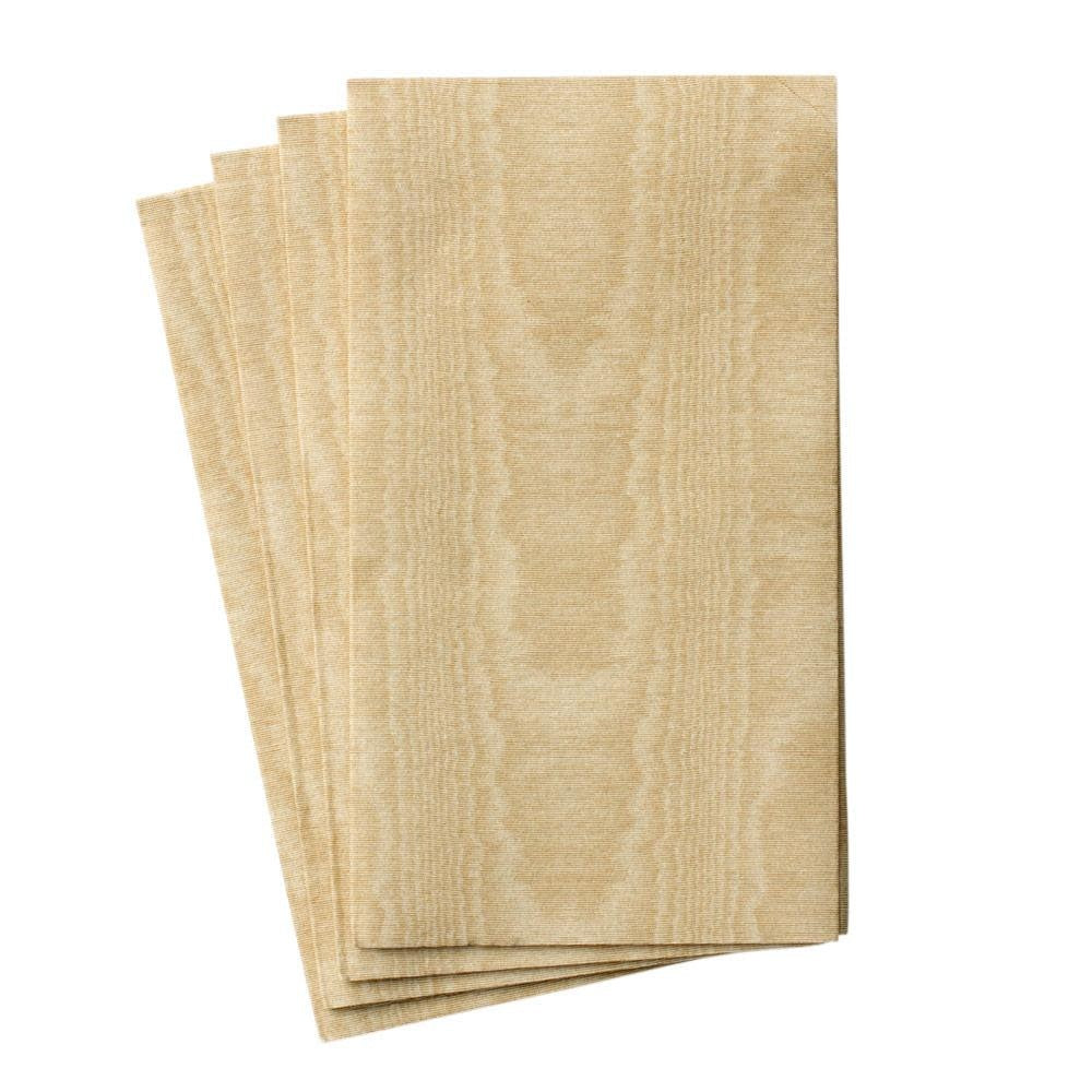 Gold moire guest towel made from paper linen with a shimmering textured pattern.