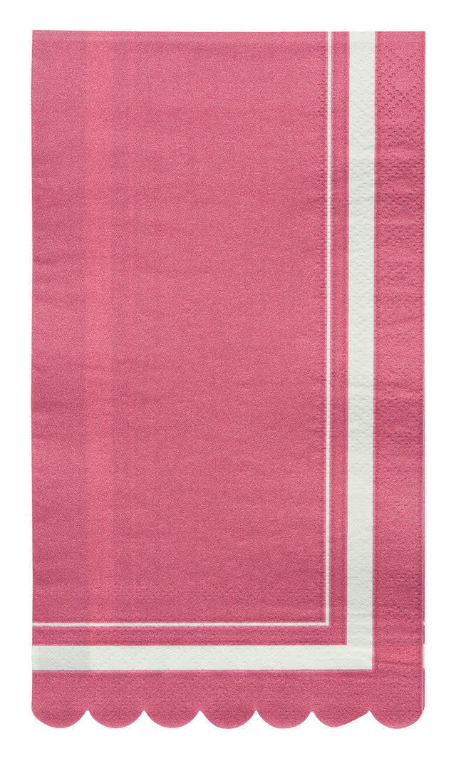 Folded berry-colored guest towel with scalloped edge wavy pattern.
