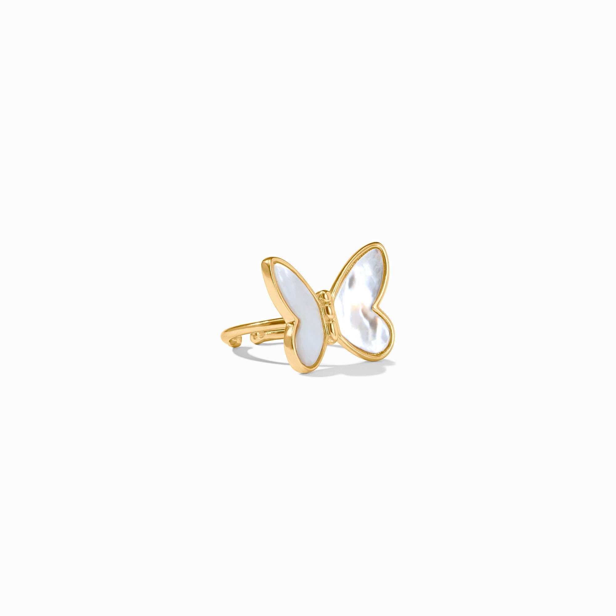 Adjustable Papillon statement ring with mother of pearl stone set in gold plate.