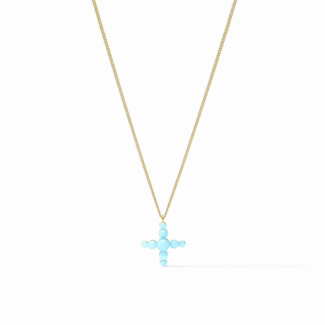 Powder blue reconstituted stone cross necklace on a delicate gold curb chain with spring clasp