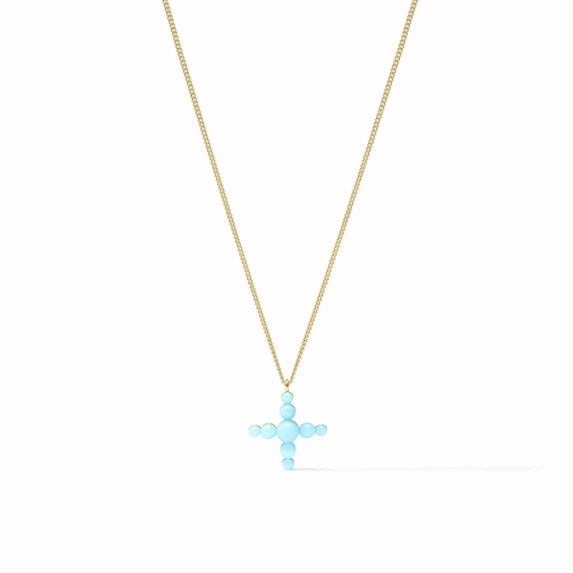 Powder blue reconstituted stone cross necklace on a delicate gold curb chain with spring clasp