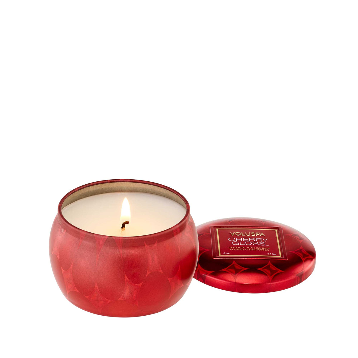 Cherry Gloss Mini Tin candle in a small rectangular glass jar with a cherry-colored wax surface and white wick.