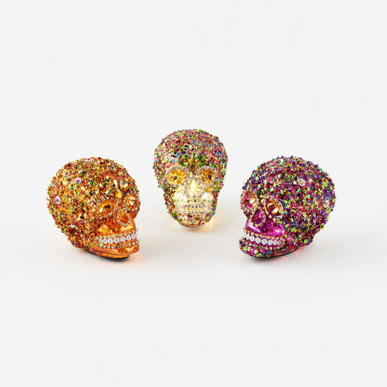 Glass decorative skull with jeweled accents