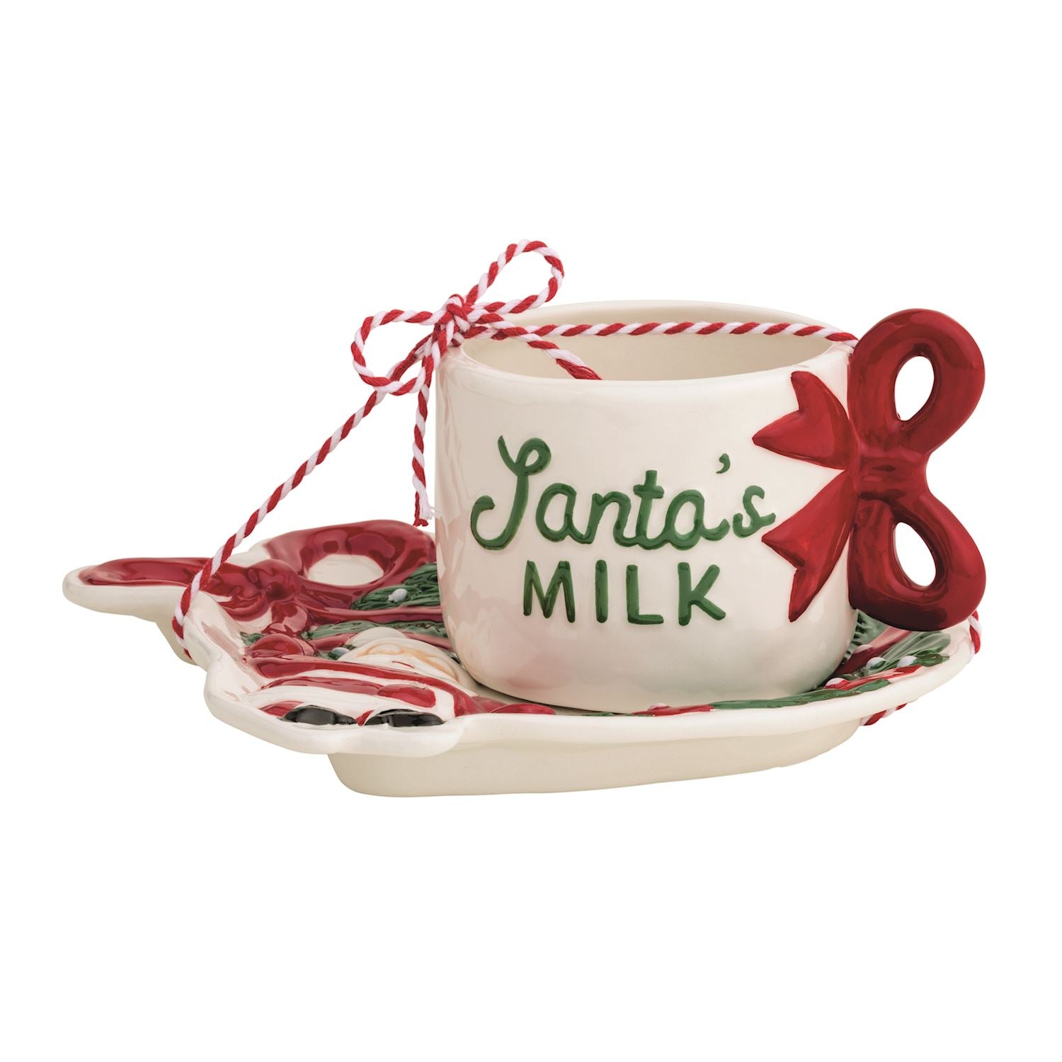 Ceramic Santa's Milk mug with a red bow handle sitting on a matching cookie plate.