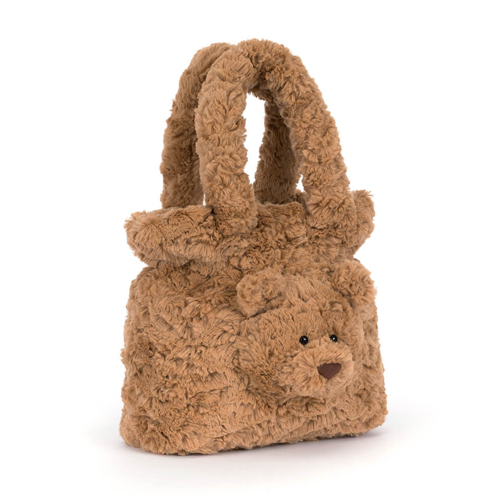 Bartholomew Bear Handbag made of soft, textured brown plush with a bear face and two top handles.