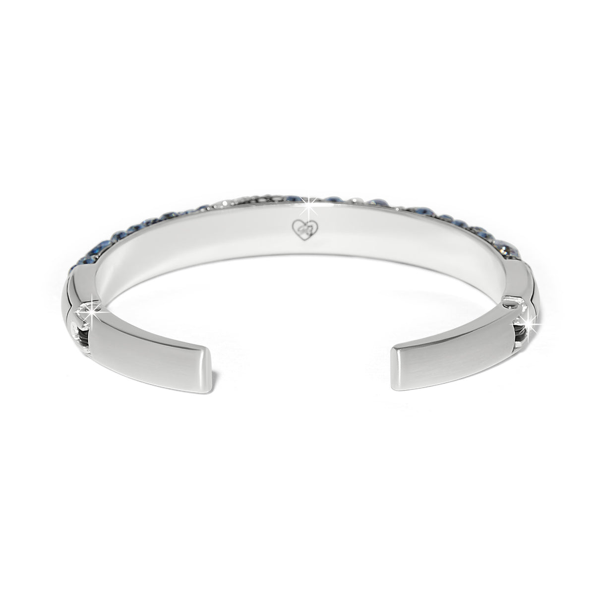 Silver plated hinged bracelet featuring fine quality sky blue crystals in a simple silhouette.