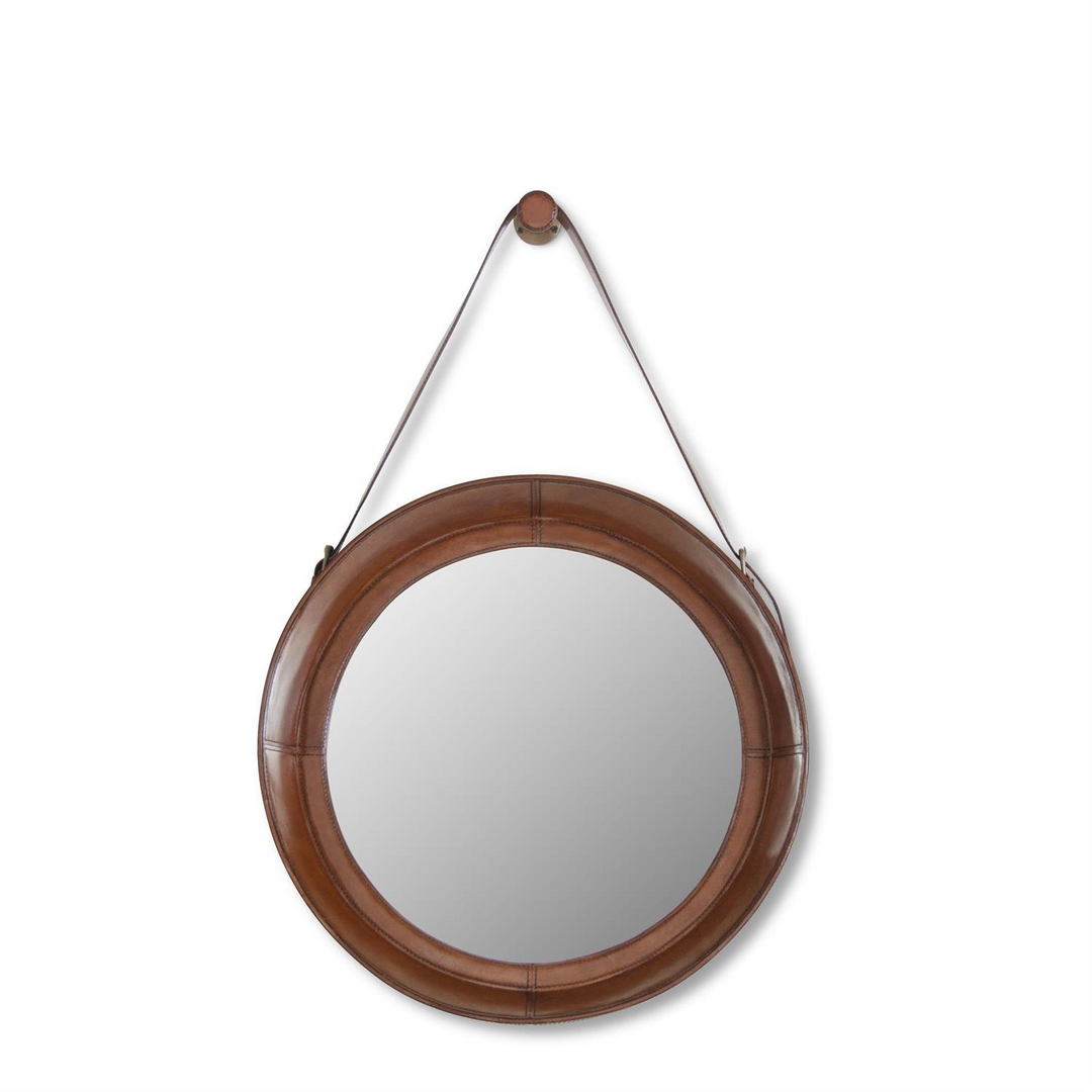 20.75 inch round wall mirror with a brown leather frame and matching hanging strap.